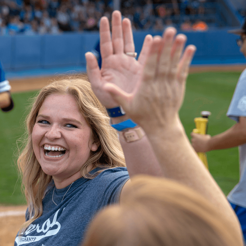 Careers_2 people high five.png